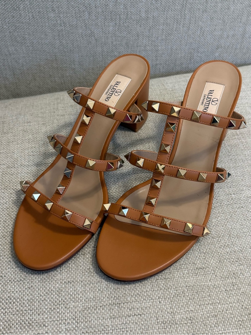 Valentino Garavani “Almond” Leather Rockstud Triple-Strap Mules 60mm